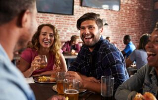 A group of people eating out together.