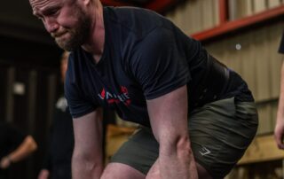 Tim Goodman performing a deadlift at the Hampshire's U90kg novice strongman competition